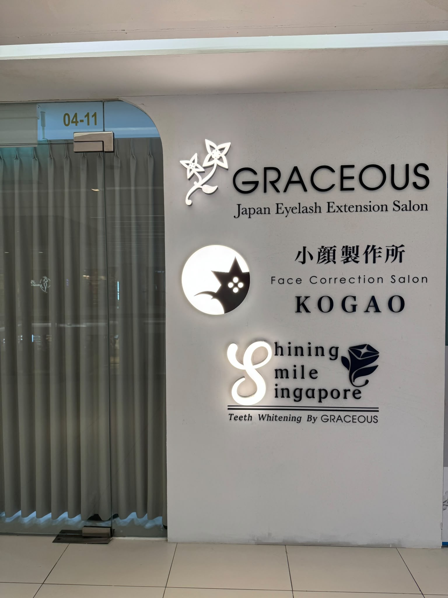 Shining Smile signage beside unit 04-11
