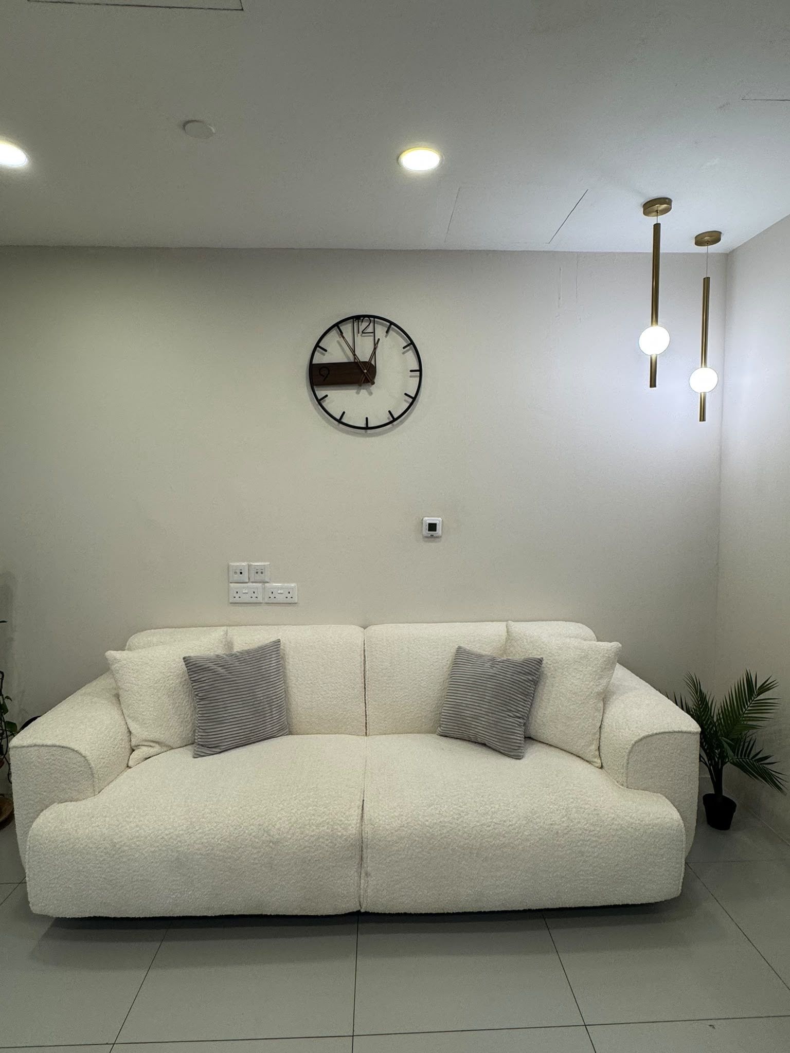 Waiting area with a white sofa
